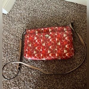 Coach Purse with adjustable strap.